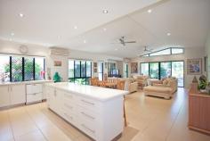 14 TURTLE PLACE BLACKS BEACH QLD 4740 $735,000 Inhale the sea breeze & exhale into a lifestyle of class & luxury! Turtle Place is a property of pure elegance, only footsteps away from the beach and minutes from retail & resorts; a location of peace and serenity yet also practicality. Four generously sized carpeted bedrooms, all with built-ins, ceiling fans & air conditioning will ensure comfort for the largest of families. The spacious open plan kitchen boasts a large stonetop island bench which acts as the central hub of the home, complete with breakfast bench perfect for morning cuppas, homework & chats while preparing dinner. There is ample cupboard space with built-in drawers in the pantry; a double fridge cavity; stunning tiled splashback & 5 gas burner cook top. The lounge & dining rooms are both open plan & are complimented by beautiful high vaulted ceilings, capturing amazing natural light and flowing breezes. Enter the outdoor entertaining area via sliding glass doors that overlook the resort styled inground pool & private, lush landscaped gardens (on automatic sprinkler systems & bore water). The Master Suite also overlooks the inground pool & is complete with walk in robe plus efficient ensuite. End a big day of sand, surf & swimming with a family movie, cuddled up in the air conditioned, tiled media room, that can be closed off from the remainder of the home, to offer extra seclusion. Then, sleep peacefully at the end of the day without the stress of water and power bills thanks to drinkable bore water & 6.6KW solar system (26 panels) that reduce these major costs. Let your dreams of resort-style living become a reality at 14 Turtle Place, surrounded by high caliber homes in a very family-friendly culdesac neighborhood. Disclaimer: The vendors and/or their agents do not give any warranty as to errors or omissions, if any, in these particulars, which they believe to be accurate when compiled. Prospective purchasers should satisfy themselves by inspection or otherwise as to the accuracy of the particulars.