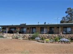 123 Lee-Steere Drive Boyup Brook WA 6244 $460,000 This spacious home has room for the growing family and is ideally positioned to make the most of the land. Everything has been done for you, so move in, relax and enjoy country living at its finest. This property is truly exceptional value! Located just two minutes from the town centre of Boyup Brook, this immaculately presented brick and iron family home is situated on 7 acres of well maintained land, with fabulous views of the Blackwood Valley. The home boasts a generous sized tiled open living area, fitted with a Jarrahdale convector wood fire and a large reverse cycle unit which cools and heats the entire house. The well-appointed country style kitchen is fitted with a stainless steel oven and range hood, the bench tops are polished solid jarrah. National Broadband Network (NBN) and pay TV connections are currently installed and the home has solar HWS. The master bedroom has an ensuite, walk in robe and reverse cycle air conditioning. The other bedrooms: 2 queen sized and 1 double, all have double fitted wardrobes. There is also a good sized study off the main living. The property is connected to mains water and also has a 5,100 gallon / 23,185 litre rain water tank which is currently used for the gardens and stock. The lawns and garden beds are water wise with reticulation and there is an orchard stocked full of fruit trees, grapes and vegetable gardens which produce an abundance of fruit annually. The large native garden is a bird watchers paradise, attracting many species of birds. There is a fenced off extra large grassed area - perfect for the growing family, with an outlook from the back veranda and entertaining area. On the property there is a large 10 x 12m powered workshop with inbuilt fireplace, LED lighting and mezzanine floor for extra storage. The perfect blokes pad. The land is divided into 3 paddocks, there are sheep holding pens and six segregated chicken pens. There is also an enclosed and secure dog yard and kennel. There is a small garden shed, wood shed and greenhouse off the side of the large shed, and a pad to park a caravan next to the house. Everything has been thought of. The two large fire pits are perfect for entertaining on cooler afternoons or evenings. Boyup Brook is a small, friendly country town on the shortest route from Bunbury to Albany. The town has a supermarket, hospital, doctors surgery with 2 full time doctors, a District High School (K-10), Private School, pharmacy, bank, cafes, post office, hotel, bowling / tennis / golf club, many sporting groups and MUCH, MUCH more. Features highlighted: - Boyup Brook is home to the famous annual Country Music Festival - Amazing public swimming pool in town - Fabulous community - Safe township - 10 x 12m powered workshop - 5100 gallon / 23,185L Rainwater tank - Scheme water - Good fencing - Great views - 3 x paddocks - 4 x 2 brick and steel frame home - Study - Jarrah bench tops in kitchen - Stainless steel oven and range hood - Two minutes from town - Large fire pits for entertaining - NBN - Pay TV (foxtel) - Solar HWS For more information or to view please contact Lisa Freer on 0429 111 848 or John Rich on 0429 101 264.