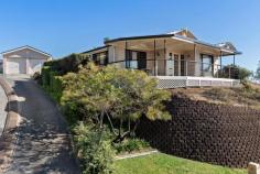 57 Delaware Drive Macquarie Hills NSW 2285 $575,000 Elevated up from the street to enjoy a bright north-easterly aspect and the most amazing views and sunsets, this warm and inviting residence offers a flowing single level floorplan with a choice of two separate living areas and outdoor flow to a wide wrap-around deck for alfresco entertaining. Delivering a real sense of peace and privacy, this is a spacious, comfortable and low maintenance home for a growing family, or readymade investment with a long-term tenant keen to stay. Step inside to a practical floorplan featuring a bright and spacious lounge room and a relaxed open plan family living and dining space anchored by a granite-topped kitchen and access to the fenced backyard where kids and pets can play with a sense of freedom. At the front of the home, far-reaching views stretch out in front of you from the deck where there's plenty of space for a dining setting and barbecue. Sleeping quarters are perfectly zoned with the master bedroom and ensuite separated from the three kids' bedrooms and the family bathroom. A freestanding double garage as well as ample driveway parking complete this appealing home. Family-friendly Macquarie Hills is quietly located on the fringe of Lake Macquarie's cafes, shopping and leisure activities with Cardiff CBD, public transport and a choice of schools nearby. * Warm and inviting brick and tile home on northeast facing 618sqm elevated parcel - Air-conditioning and gas heating to lounge and family room - A neutral palette complements a mix of tiles and carpet underfoot - Wide wrap-around deck at front of home and fenced landscaped garden at rear - Kitchen with granite benches, gas cooktop and dishwasher - Bathroom with Caesarstone vanity, bathtub, shower and separate w/c - 3 kids' bedrooms all with built-in robes share a family bathroom with separate w/c - Double freestanding garage with one automatic door - Less than 10 minutes drive to Lake Macquarie and 20 minutes to Newcastle CBD - Available with vacant possession or with happy long term tenant Disclaimer: All information contained herein is gathered from sources we deem reliable. However, we cannot guarantee its accuracy and act as a messenger only in passing on the details. Interested parties should rely on their own enquiries. Some of our properties are marketed from time to time without price guide at the vendors request. This website may have filtered the property into a price bracket for website functionality purposes. Any personal information given to us during the course of the campaign will be kept on our database for follow up and to market other services and opportunities unless instructed in writing.