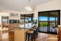 41 The Ridgeway Cumbalum NSW 2478 $760,000 - $820,000 Located in an elevated position this contemporary family home offers wide ranging hinterland views which can be particularly enjoyed from the large timber deck that would be the perfect place to entertain guests. The home is in great order with lovely polished timber floorboards in the living areas complimented by high ceilings with an abundance of natural light and cross ventilation. There is the bonus of a big storage area under the house which is ideal for a gym or perhaps the ultimate man cave'. Family friendly location with new sporting fields nearby and a safe cycleway through to Ballina. • 4 good size bedrooms plus an office • Covered garaging for 4 vehicles with a double garage plus carport • Only a 10 minute drive to Ballina or 15 minutes to Lennox Head • Great size block of 929m2 with room for a pool..