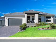 18 Macquarie Drive Burrill Lake NSW 2539 $869,000 - $920,000 Open plan living with high end finishes feature throughout this immaculate coastal home, that has been built with luxury in mind. Surrounded by low maintenance landscaped gardens, this home leaves you nothing to do but enjoy the superb location, moments walk to lake fishing and sandy beaches. Features Include; – gourmet kitchen with island bench and stone tops – walk-in pantry and high end Smeg appliances – huge north facing open plan entertainers living area drenched in sunlight, which seamlessly flows out to covered alfresco dining/ BBQ area – second separate living room ideal for some quiet time – master king size bedroom enjoying walk-in robe and luxury ensuite which includes a deep soaking bath and his/hers vanity – remaining 3 bedrooms all generous in size and complete with built-in robes – ducted air-conditioning throughout – landscaped gardens and yard surround the home – side access with concrete pad ideal for caravan/ boat – bush and wetland outlook teaming with birdlife – secure double garage with internal access – 6.6kw solar, gas heating and water tank – security alarm fitted Situated within walking distance of shops, Burrill Lake, fishing platforms, sandy beaches and the picturesque Dolphin Point, join this lovely coastal community in style. Features • Alarm System • Boat or Caravan Storage • Built-In Wardrobes • Dishwasher • Ducted Cooling • Ensuite • Entertainers Delight • Fully Fenced • Near Beach • Near Lake • Outdoor Entertaining • Remote Garage • Side Access • Single Level • Water Tank..