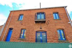 12 The Parade Tumbarumba NSW 2653 $449,000 The carving in the brickwork says it all "1885" One of Tumbarumba's oldest buildings is now up for grabs with some serious return potential! This warehouse conversion pays respect to its heritage with unique charm and character. I bet if the walls could talk there would be some unique stories to tell! Known as Blencowe's back in the day where I used to buy my cobbers and milk bottles the building still retains thick double brick walls, original polished floor boards and soaring ceilings which define it. The building consists of: A double storey warehouse style residence with spacious downstairs living area, modern kitchen and an instantly inviting stair case which leads you to the upstairs bedroom, modern Bathroom and small balconette. Take me back a century already! Currently tenanted at $260 per week. Access for this residence is via Union Lane. A huge shopfront (currently trading as an antique store but will be sold with vacant possession). Wide frontage of the main street with a huge amount of commercial potential. Think restaurant's, tapas bars ... word has it there's even a downstairs cellar! Potential rent of $250 per week. Access for this shopfront is via the main street (The Parade) The small shopfront is attached to the large shopfront and is accessed from main street (The Parade). Ideal for a coffee window or handy as an office for an adjoining business. Potential Rent of $90 per week. The Middle Residence kitchenette and small bathroom amenities, Loungeroom with wood heating. These facilities are basic and could use an update. This residence would be perfect for backpacker accommodation during picking season.(access from Union Lane) Rumour has it there's even an old well directly below this point! There's so much potential with this big old bold building - it gives me the feel of something you would find in Beechworth! With tourism at it's peak in town - what will you make it?
