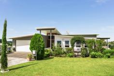 12 Cloudwalk Drive Maleny QLD 4552 $699,000 Fresh and functional this architecturally styled home will appeal to someone who appreciates good quality. Step into the foyer that leads to a lovely living room - dining and contemporary white kitchen. Lots of light and pretty views. Plus the Butlers pantry (lots of storage) and a combined laundry and airing room are adjacent to the kitchen making it the ideal utility area. Very generous easterly facing covered deck expands the living and entertainment area. Upstairs the Master bedroom looks out over the deck. Ah! morning sunshine (Ensuite & WIR). 3 additional bedrooms and a family bathroom cater for family or guests. Throughout the home are beautiful Tasmanian Oak polished timber floors. High planing ceilings are on the upper level providing a lovely airy environment. The expansive exterior decks and the garage floor are all hardwood. There is potential under the house to build in further rooms subject to council approval. Lovely country views of lush green pasture and neatly landscaped grounds add to the ambience of this home. No neighbours either side. Double car garage. Walk to Maleny Township. Beautifully presented awaiting a new owner. Call Geoff Wells 0418787060