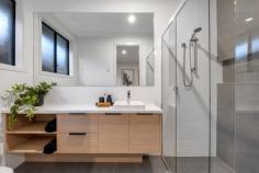 46A Sutton Avenue Seacombe Gardens SA 5047 $540,000 - $570,000 So new the paint is barely dry, this superb Fairmont Homes Torrens Title property offers a contemporary floor plan in a truly enviable location. Directly opposite the expansive Sandery Avenue Reserve and within walking distance of various others, a wealth of shopping options is also easily accessible, including Westfield Marion Shopping Centre. You’ll also be within 10-minutes of Brighton’s beautiful shores and buzzing Jetty Road – just in time for summer. A stunning entry flooded with natural light leads onto an equally well-lit north-facing lounge with access to the garage, before a hallway guides you past three generous bedrooms including a master with walk-in robe and ensuite bathroom. Servicing bedrooms two and three, the central main bathroom offers a full-size bath and spacious shower, with the convenience of a separate w/c. Open plan and flexible in its arrangement, the kitchen, living and dining space is beautifully laid out, with full-height sliding doors opening onto decked alfresco under the main roof overlooking a manicured backyard. A double door pantry, dishwasher, double sink and island bench with breakfast bar will ensure the comfort of trained and trainee cooks alike in the sleek airy kitchen. It’s the little things that make this brand-new build such a big deal: – Floor-to-ceiling tiling to bathrooms – Stone benchtops – 900 Westinghouse Oven & Cooktop – Ducted reverse cycle air conditioning throughout – Complete landscaping – All new fencing – Rendered façade & superb street appeal – Exposed aggregate driveway – Unrivalled position opposite huge local Reserve Eligible first home owners (conditions apply), secure your $15,000 grant – here is an opportunity not to be missed. Delivering on the design and every detail. You won’t find another one like Sutton Avenue.
