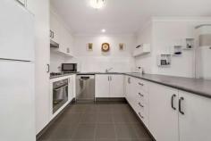 232 Macfarlane Burnet Avenue Macgregor ACT 2615 $560,000 On offer is the opportunity to call this tidy three bedroom property home. This functional floor plan is ideal for young couples, families or down sizers alike. It is evident that this lovely home has only had one owner and been well looked after and maintained over the years. Open plan kitchen / dining / living area is flooded with an abundance of northern natural light. This space opens onto the outdoor alfresco, and with the addition of the pergola, offers the perfect space for you to entertain outside whether rain, hail or shine. Complete with a low maintenance and landscaped backyard, fully fenced with vegetable / herb boxes to the rear. Perfect for pets, families with children and those who enjoy spending time in the garden. All set on the outskirts of New Macgregor with easy access through to Belconnen Town Centre and back into the city, you will enjoy all the conveniences of the area for many years to come. • A functional floorplan with a spacious and sunny living area • All three bedrooms are carpeted and have built in robes • Main is generous in size and includes walk-in, built-in and ensuite • Main bathroom offers bathtub and separate toilet • Kitchen has great storage, bench space and gas cooktop • Offering open plan dining / living area with lots of natural light • Wall mounted heater and split system installed in the dining / living area • Covered outdoor alfresco offers a private space to entertain • Easy care gardens to the front and rear • Solar system installed • Single car garage with internal access • Conveniently positioned close to popular shops and schools • Great routes for walking and / or bike riding in the area..