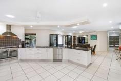 66 Dempsey Street Gordonvale QLD 4865 $895,000 This beautifully presented family property has everything that's required to make that easy transition into acreage living... The stunning home offers an enviable choice of living, dining and entertaining areas which flow seamlessly out to a vast covered alfresco entertaining area that overlooks a sparkling in-ground pool with kids slide. Centrally located, the chef's kitchen is complete with granite bench tops and an abundance of storage, ensuring preparing family meals or entertaining on a grand scale is done with ease and elegance. - Walk In Pantry / Gas Cooking - Two Drawer Dishwasher - Split System Air Conditioning - Solar Power ( 5kw )& Solar Hot water ( 46 Panels in Total ). The master bedroom provides comfort in size, there is a walk in robe and spacious ensuite with his & her vanity's and showers. The remaining three bedrooms have builtins, split air conditioning and the complete home is fully tiled. The shed measures in at 17m x 9m in size, there is power and water connected and four extra high roller doors. ( Space for your large boat and caravan ). At the front of the shed there is an added granny flat with bathroom, separate toilet and split system air conditioning. ( ideal for the older child or family friend that comes to stay ). There is also a doubled sized garden shed for storage of mowing / gardening equipment. This property is fully fenced with two street access, automatic entry gates, established gardens & privacy hedging. Gordonvale is 25 minutes drive South of Cairns CBD, there is shops, schools, doctors, sporting facilities, hotels and much much more. - 35 Minute Drive To Cairns Domestic & International Airport For More Information or Your Private Inspection Phone Brian Bolton 0n 0402 440 098 FEATURES: • Air Conditioning • Built-In Wardrobes • Close To Schools • Close To Shops • Close To Transport • Garden..