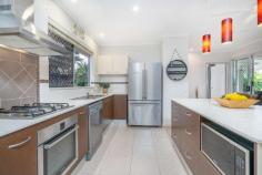 32 Archibald Street Edmonton QLD 4869 If you're after an affordable family home with lots to offer that is minutes to shopping and sporting this property should be at the top of your list. Positioned on a level and low maintenance 570m2 block and located just 20 minutes from Cairns City centre and the popular Cairns Esplanade. Inside, the home offers a spacious and modern tiled open plan design with a neutral colour scheme and easy access through double sliding doors flowing seamlessly onto the large private undercover rear patio. Enjoy the atmosphere of the private gardens all year round. The galley style kitchen is well kitchen designed for family living and entertaining across all scales and is appointed with stainless steel appliances, granite benched and ample preparation space, breakfast bar, corner pantry, new dishwasher and plumbed ready for your fridge and has easy access to meals and living. Offering a spacious master suite with walk in robe and en-suite complete with double vanities and sliding door opening to patio. The remaining two bedrooms are built in, generous in size and carpeted. These two bedrooms are serviced by a second bathroom, finished with a bathtub, large shower and single vanity. Other notable features include: • Office nook • Internal laundry with bench space • Air conditioned and security screened throughout • Linen cupboard • WasteMaster food waste reduction system • Double remote car accommodation with internal access • Low maintenance reticulated established gardens • Security camera system • Tinting to some windows • Sound system to patio and lounge • Generator change over switch • Work bench and shelving to garage • Safely fenced to rear • Garden shed • Vegetable garden • Double power points throughout the home • 4kw Enphase solar • 2019 outside painting with reflective paint (eaves and walls) This home will appeal to all and simply must be viewed with an asking price in the high $300's range. Call Therese Plath on 0418 772 995 or email at therese.plath@raywhite.com FEATURES: • Air Conditioning • Built-In Wardrobes • Close To Schools • Close To Shops • Close To Transport • Garden