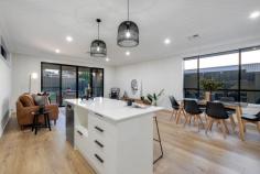 46A Sutton Avenue Seacombe Gardens SA 5047 $540,000 - $570,000 So new the paint is barely dry, this superb Fairmont Homes Torrens Title property offers a contemporary floor plan in a truly enviable location. Directly opposite the expansive Sandery Avenue Reserve and within walking distance of various others, a wealth of shopping options is also easily accessible, including Westfield Marion Shopping Centre. You’ll also be within 10-minutes of Brighton’s beautiful shores and buzzing Jetty Road – just in time for summer. A stunning entry flooded with natural light leads onto an equally well-lit north-facing lounge with access to the garage, before a hallway guides you past three generous bedrooms including a master with walk-in robe and ensuite bathroom. Servicing bedrooms two and three, the central main bathroom offers a full-size bath and spacious shower, with the convenience of a separate w/c. Open plan and flexible in its arrangement, the kitchen, living and dining space is beautifully laid out, with full-height sliding doors opening onto decked alfresco under the main roof overlooking a manicured backyard. A double door pantry, dishwasher, double sink and island bench with breakfast bar will ensure the comfort of trained and trainee cooks alike in the sleek airy kitchen. It’s the little things that make this brand-new build such a big deal: – Floor-to-ceiling tiling to bathrooms – Stone benchtops – 900 Westinghouse Oven & Cooktop – Ducted reverse cycle air conditioning throughout – Complete landscaping – All new fencing – Rendered façade & superb street appeal – Exposed aggregate driveway – Unrivalled position opposite huge local Reserve Eligible first home owners (conditions apply), secure your $15,000 grant – here is an opportunity not to be missed. Delivering on the design and every detail. You won’t find another one like Sutton Avenue.
