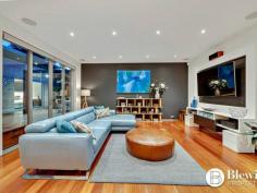 14 Aspen Rise Jerrabomberra NSW 2619 $1,450,000 Situated in the sought-after location of Aspen Rise is this striking and truly unique residence located in an elevated position opposite tranquil bushland and commanding glorious views. As you enter the grand foyer through the colossal custom pivoting front door you will be impressed by the two-storey feature stone wall with floating staircase, solid timber floors and a wrought iron gate which leads to the superb wine cellar. From the foyer you are guided up the stairs to the spectacular open plan living area. This space opens out to the entertaining area which overlooks bushland and provides views right through to the city. The open plan living area boasts solid timber floors, north facing windows including electric clerestory windows and glass doors that completely open up to create the ultimate inside outside living space. The living area consists of the kitchen, spacious lounge and dining areas which could easily cater for any sized furniture. The showstopper of the living area has to be the impressive kitchen with two stone and timber island benches that provide more bench space than you could wish for as well as an integrated fridge-freezer and new double ovens. The stunning master bedroom which is located at the front of the property also boasts outstanding views. This luxurious room offers its own large covered balcony, display shelves, double built-in robes as well as a one of a kind ensuite with stone bench top, timber feature wall and stone bulkhead that runs through to the bedroom. The remaining bedrooms all have built-in robes and views along with built-in sensor lit shelving. The main bathroom boasts a bath, large shower and feature stone vanity. The large laundry features the same stone bench, offers great storage and outdoor access. Outside you will find the second outdoor entertaining area with heated spa. This space includes a combination of open and covered spaces providing you with year-round entertaining options. As you wander up the yard you will find the viewing deck which leads on to the secluded fire pit area, vegetable gardens and storage shed. The designer landscaped gardens boast an extensive lighting plan and automated irrigation system programable from your phone and supplied by two 10,500 litre rain water tanks. The oversized double garage includes an impressive home office and workshop area. The garage offers hot and cold running water along with incredible storage solutions. For additional parking requirements there is a large carport located next to the front entrance. Ensure you make the time to view this remarkable masterpiece for yourself. Features: – Architecturally designed – Prestige location overlooking bush reserve – Magnificent views – Spectacular entry with floating staircase – Open plan living area – Solid timber floors – Custom kitchen cabinetry including integrated fridge-freezer – Two stone island kitchen benches – Back-lit wine cellar – Multiple outdoor entertaining areas – Elevated viewing platform and fire pit area – Raised vegetable gardens – Built-in natural gas BBQ – Bespoke stone features, doors and lighting – Solar panels – Ducted vacuum system – Ducted reverse cycle airconditioning – Security system with cameras – 2 car garage plus office and workshop space – Large carport next to front entry – Irrigated gardens, programmable by phone – 2 x 10,500 litre grey water and garden irrigation tanks PROPERTY FEATURES • House • 4 bed • 2 bath • 3 Parking Spaces • Alarm System • Land is 1,021 m² • 3 Garage • Remote Garage • Dishwasher • Built In Robes • Vacuum System • Balcony • Deck • Outdoor Entertaining . Shed..