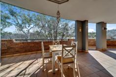 19/10 Hopegood Place Garran ACT 2605 $595,000+ PLEASE NOTE IF NOT SOLD PRIOR, THIS PROPERTY WILL GO TO AUCTION THURSDAY 3RD SEPTEMBER - 2/14 WALES STREET, BELCONNEN AT 2PM With 109 sqm of living space, an extra 45 sqm of balcony space, and only a single step into the building, this apartment is sure to impress. The popularity of these spacious apartments is easy to understand when you enter this meticulously maintained and well built complex. The location is ideal with the Garran shops right next door and the Canberra Hospital and Garran Primary just moments away. But make no mistake, these external benefits are well complemented by the comfortable and airy home inside. With just one step to enter this ground floor apartment you are greeted with a spacious open-plan living and dining area that opens up into one of the largest north-facing balconies in the complex, overlooking the green parkland leading down to the Garran oval. This open living space is north-facing, with the large full-length windows letting in plenty of sunlight and creating a light and airy feel. The kitchen features a marble breakfast bar, and plenty of storage. Off this main living area is a separate laundry with a sink and space for a washer and dryer, as well as a generous main bathroom including a combined bath and shower. Both double bedrooms are carpeted with the second bedroom including a built-in-robe and the north-facing master bedroom featuring access to the balcony, as well as a walk-through robe, and a large ensuite with double vanity. The home has the added bonus of a spacious linen closet, a double lock-up basement garage, a split system air conditioner in the living area and in-slab heating throughout, and plantation shutters to both bedrooms. Combine this prime location with the quality of the home and this apartment is the perfect opportunity for downsizers, first home buyers, professional couples, and investors alike. With beautiful maintained grounds and an enviable proximity to popular local shops, schools, as well as public transport, this home is a unique opportunity you won't want to miss. Features Well maintained complex Ground floor two bedroom apartment with just one step to the entry Large north-facing open-plan living and dining area A large north-facing balcony running the whole length of the apartment Kitchen features marble breakfast bar and ample storage Separate laundry with sink Generous main bathroom with combined bath and shower Secondary bedroom with built in robe North-facing master bedroom , balcony access, plantation shutters, walk-through robe, ensuite with double vanity Linen closet Double lock-up basement garage Split system air conditioning in living area In-slab heating throughout Crimsafe security screen to external doors Plantation shutters in master bedroom Close to local shops, schools, public transport, and Canberra Hospital In the school catchment area from Garran Primary School and Alfred Deakin High School Perfect for first home buyers, professional couples, and investors EER 4.5 stars Built in 2002 Living space approximately 109sqm Balcony approximately 45sqm Rates approximately $1,728 per annum Body Corporate approximately $6,204 per annum FEATURES: • Air Conditioning • Built-In Wardrobes • Close To Schools • Close To Shops • Close To Transport • Secure Parking