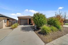 232 Macfarlane Burnet Avenue Macgregor ACT 2615 $560,000 On offer is the opportunity to call this tidy three bedroom property home. This functional floor plan is ideal for young couples, families or down sizers alike. It is evident that this lovely home has only had one owner and been well looked after and maintained over the years. Open plan kitchen / dining / living area is flooded with an abundance of northern natural light. This space opens onto the outdoor alfresco, and with the addition of the pergola, offers the perfect space for you to entertain outside whether rain, hail or shine. Complete with a low maintenance and landscaped backyard, fully fenced with vegetable / herb boxes to the rear. Perfect for pets, families with children and those who enjoy spending time in the garden. All set on the outskirts of New Macgregor with easy access through to Belconnen Town Centre and back into the city, you will enjoy all the conveniences of the area for many years to come. • A functional floorplan with a spacious and sunny living area • All three bedrooms are carpeted and have built in robes • Main is generous in size and includes walk-in, built-in and ensuite • Main bathroom offers bathtub and separate toilet • Kitchen has great storage, bench space and gas cooktop • Offering open plan dining / living area with lots of natural light • Wall mounted heater and split system installed in the dining / living area • Covered outdoor alfresco offers a private space to entertain • Easy care gardens to the front and rear • Solar system installed • Single car garage with internal access • Conveniently positioned close to popular shops and schools • Great routes for walking and / or bike riding in the area..