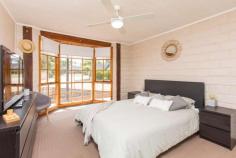 299 Tenth Street Mildura VIC 3500 $294,000-$323,400 This stunning home is a real surprise inside. It would not look out of place in a mountain setting by the lake. You'll appreciate returning home at day's end with beautiful timber features throughout, including vaulted ceilings with 'highlight' windows. The mud brick construction is both unique and a point of difference. Expertly built, the home offers all mod' con's including a spacious modern kitchen, three generous bedrooms with BIR's, air-conditioning, ceiling fans. There's a terrific outdoors area under cover and a separate bungalow ideal for teens or visitors. The picture is complete with a large workshop shed with side access for the tradies featuring concrete floor and power. Priced affordably, there's every reason to buy. Rental appraisal of $360 Per week. An inspection will impress.