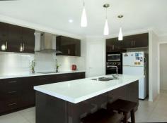 33 Wigan Avenue Highfields QLD 4352 $489,000 Looking to downsize and stay in the heart of Highfields, then this is your next home. Built in 2015 by Top of the Range builders and finished with quality fixtures, fittings and appliances. Main bedroom complete with walk in robe and ensuite with double vanity. Features include - Caesar stone bench top Split air conditioning Ceiling fans Large covered entertaining area Plenty of storage Allotment 482m2 General rates $1011.87 net year Water access charge $304.59 net year FEATURES: • Air Conditioning • Built-In Wardrobes • Garden • Secure Parking..