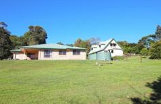 13 BERGANNS RD WITTA QLD 4552 $875,000 Witta offers the perfect rural lifestyle and is just ten minutes to the vibrant township of Maleny. Located on a 4000m2 block, this property offers a main house and a second Council approved dwelling; ideal for dual living with family, accommodating visitors or running a B&B. The ever popular Witta General Store and Witta Markets are just minutes away and feature the best of hospitality and Hinterland produce. Main House: - Three bedrooms with built-ins - Main bathroom - En suite to master - Family room - Open plan living - North-facing patio with rural aspect- Covered entertaining area - Gently sloping acre with established garden and fruit trees Second Dwelling - Three bedrooms - Large living area - Country Kitchenette - Stylish bathroom - Covered cooking area With so much on offer for the family looking to create dual living or create potential income- this home must be inspected today. To arrange your private inspection today, phone exclusive agent Rodney Millett on 0477 702 073 or email rodney@malenyrealestate.com.