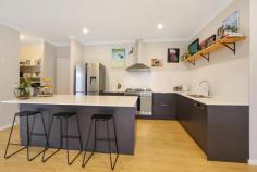 7 Griffiths Road Tangambalanga VIC 3691 $489,000 Nestled in Tangambalanga's most sought-after location, this family home offers a level of character which is sure to impress. With 36.41 squares under roof spread across multiple living zones, this 12-month-old Bridgewood Built home is a class above the rest. Upon entry you are greeted by high ceilings, beautiful timber look flooring and the general feeling of space that flows through the whole home. A formal lounge is perfect for the family movie night or just a quiet space to sit and catch your breath. Comprising of four spacious bedrooms, three offering built in robes, while the over-sized master features an ensuite and walk in robe. Designed with the growing family in mind the main bathroom is thoughtfully positioned at the rear of the home, close to the third living space or kid's zone. Saturated in natural light, the open plan kitchen is brimming with designer touches complete with granite benchtops, high quality appliances and a walk-in pantry offering an abundance of storage options. The living and meals area is just stunning, opening up to the undercover outdoor living space, bringing the outdoors in. Enjoy a glass of wine and take in the view of the surrounding mountains from the rear entertaining area. Living costs are kept to a minimum with the installation of a 5-kilowatt solar system and water tank. Your vehicles and toys are out of the elements in a double lock up garage with remote roller doors and internal access. The double gates offer access to the rear yard which provide extra parking space for a boat or caravan. The perfect mix of indoor and outdoor living, this family home truly is a class above! Call today to arrange your private inspection.