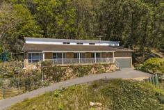 42 Glenrock Parade Koolewong NSW 2256 Waking up to spectacular views of the stunning Brisbane Water every morning is something we could all get used to. This perfectly located home is tucked away just 3 minutes from Woy Woy in a private coastal waterside setting on a huge 2022m2 block. The property features 4 bedrooms, a master with en suite and study/nursery. 3 bathrooms and a large internal laundry room plus double garage. There is also a teens retreat or guest sleep out with separate kitchen and bathroom. The tiled floors through the living and dining areas lead out onto a huge covered entertaining deck, you can enjoy the breathtaking panoramic views while you dine alfresco or just simply relax and enjoy the serenity with Brisbane Water and the new marina as your backdrop. The possibilities and room to grow with this one are huge, securing this property and adding your own touches to it, would see this house become your dream home very quickly. For more information and to view this property please call Jaben Ryan on 0498112526 If you are looking to buy but you need to sell first. Please call me to arrange a free and confidential market appraisal. Property Features • Northeast facing water views • 4 bedrooms with ensuite and study to the main • 3 bathrooms • Tiled floors throughout the living and dining areas • Private bush setting on 2022m2 block • Large entertaining deck overlooking the marina • Road, rail and ferry options all at your door • 1 hour from Sydney CBD..
