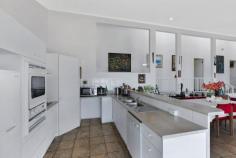 42 Glenrock Parade Koolewong NSW 2256 Waking up to spectacular views of the stunning Brisbane Water every morning is something we could all get used to. This perfectly located home is tucked away just 3 minutes from Woy Woy in a private coastal waterside setting on a huge 2022m2 block. The property features 4 bedrooms, a master with en suite and study/nursery. 3 bathrooms and a large internal laundry room plus double garage. There is also a teens retreat or guest sleep out with separate kitchen and bathroom. The tiled floors through the living and dining areas lead out onto a huge covered entertaining deck, you can enjoy the breathtaking panoramic views while you dine alfresco or just simply relax and enjoy the serenity with Brisbane Water and the new marina as your backdrop. The possibilities and room to grow with this one are huge, securing this property and adding your own touches to it, would see this house become your dream home very quickly. For more information and to view this property please call Jaben Ryan on 0498112526 If you are looking to buy but you need to sell first. Please call me to arrange a free and confidential market appraisal. Property Features • Northeast facing water views • 4 bedrooms with ensuite and study to the main • 3 bathrooms • Tiled floors throughout the living and dining areas • Private bush setting on 2022m2 block • Large entertaining deck overlooking the marina • Road, rail and ferry options all at your door • 1 hour from Sydney CBD..