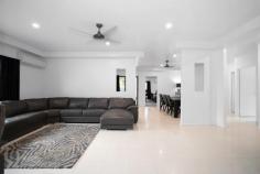 18 MALONE DRIVE ANDERGROVE QLD 4740 $580,000 Located in the most sought-after cul-de-sac in Andergrove, you will find this stunning family home that oozes quality & luxury throughout, in such a central location, minutes from Woolworths, schools, takeout and service stations. This freshly painted impressive family home will cater for everyone. With high ceilings hosting new modern fans & large indoor and outdoor entertaining areas, the beautiful open plan living flows seamlessly and is the perfectly balance between luxury and practicality. The Master Bedroom is located at the back of the house, with direct access to back patio and away from the other three bedrooms. With massive walk-in robe leads to the luxurious ensuite featuring, large spa bath, double vanities, separate shower and toilet with full-size bath for the longest of soaks! The kitchen is large & well positioned, boasting optimal bench space plus storage and flows beautiful to the huge living and dining area. The kitchen overlooks the beautiful alfresco dining areas that reach over brand new, modern stunning tiles (used recently on The Block!) & continue to the huge expanse of slate look tiles around the entire perimeter of the home, made even more comfortable by the addition of large outdoor awnings to enhance your entertaining experience - these tiles & additional awnings are clear examples that the meticulous owners have not spared any expense to ensure superior quality through the entire home. Three other generously sized bedrooms with luxurious carpet that feels great under foot, built-ins with recently serviced air conditioners are all found at the front of the home, leaving privacy & supremacy for the Master Suite. There is also large storage cabinet that creates a hallway adjacent to the bedrooms, sectioning them off nicely for the rest of the house. The spacious bathroom is large enough for all of the kids to share in harmony! The laundry has large bench space, storage and direct access outside to the washing line with easy-maintenance look alike slate tile surrounds. The front entry is just stunning & so welcoming for guests, with the beautiful slate look tiles enhanced with a modern feature tile, creating a pathway from the driveway to front door with established gardens adding extra privacy in the front bedrooms. The double bay remote panel lift roller door allows entry into the oversized double garage with direct entry into the central living area of the home. A third roller door allows drive-through access on vitrified load bearing slate tiles into the back yard with new privacy fencing, but double side gate access allows even greater access if required. Lawn Locker storage on the other side of the backyard provides all storage needs. Disclaimer: The vendors and/or their agents do not give any warranty as to errors or omissions, if any, in these particulars, which they believe to be accurate when compiled. Prospective purchasers should satisfy themselves by inspection or otherwise as to the accuracy of the particulars.