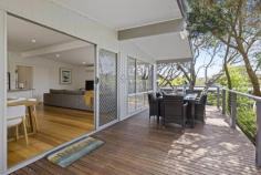 26 Scott St Blairgowrie VIC 3942 $885,000 - $970,000 Superbly updated to provide every contemporary comfort while retaining its laidback beachy chic vibe, this is the perfect home to relax, retire or recharge in a beautiful coastal setting Just a fun bike ride down to Blairgowrie’s fabulous beachside café strip, a couple of minutes to the Tyrone Foreshore boat ramp to launch your boat for a day on the bay or why not explore Bridgewater Bay and the ocean coast only a short stroll in the other direction? The two-storey, three-bedroom home is custom made for blissful beachside breaks or those wanting a permanent sea change set amid native moonah gardens offering dappled shade and privacy with nothing left to do but sit on the entertaining balcony and read the weekend papers or settle back in front of the cosy gas log fire in winter. A crisp interior palette anchored by timber floors provides class and comfort upstairs along with two bedrooms and the main bathroom as well as a spotless kitchen with a stainless-steel oven and dishwasher and ample storage. Sliding doors lead out to the fabulous north-facing entertaining balcony while a second set of stairs descend down to the gardens, a four-car carport and a combined laundry and bathroom and separate bunkroom for the kids. Hockingstuart | Belle Property is proud to be offering this property for sale. To arrange an inspection or for further information, please Tim Bradler on 0400 312 412 or tim.bradler@belleproperty.com