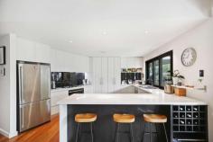 11 Village Court Mansfield VIC 3722 $895,000-$965,000 Ultra modern architecturally designed home by renowned Melbourne Architect Maxa Design. With 7.8 star energy rating his house has almost everything that opens and shuts including CBUS control system, which allows you to control all the lighting, utilities, sprinkler system and more from the home keypad or your mobile phone! Tucked away in an exclusive cul-de-sac with shedding, magnesium pool, veggie gardens, chicken coop whilst being close to all things that matter. An easy walk to Mansfield's Primary and Secondary Schools, medical, sporting facilities, vibrant shops and eateries! • Enjoy cooling off in the summer months or hosting pool parties around the pool • Mains water connection plus a 20,000lt underground rainwater concrete tank • 4 bedroom 2 bathroom home situated on a generous 1023m2 block (approx) • Stunning kitchen with Stone bench tops with waterfall ends & glass splash-back • Walk in pantry, soft-close cabinetry & Fisher Paykel appliances to cook up a storm • Spotted gum flooring, New Zealand woollen carpets & quality underlay throughout • Impressive 10ft ceilings, db glazed windows tilt & turn with feature remote blinds • Light-filled living room with feature fireplace with inbuilt speakers & storage • Central study nook - great space to close the doors & conceal the paperwork! • Master suite with feature wall, walk-in robing, remote shade & block out blinds • En-suite with under-floor heating, WC, stone top vanity & frameless shower • Bedroom 2 features custom built timber bunks, 4 berth ideal for kids sleepovers • 2 further carpeted bedrooms with custom robing, shelving & study nook • Versatile office/study at entrance with reverse cycle system & lots of natural light • Separate rumpus or media room gives another flexible option for family living • Floor to ceiling tiled bathroom, shower, bath, underfloor heating & separate WC • Oversized laundry with generous storage, ducted vacuum system in kitchen • 7.8 Energy rating, well insulated, db glazing, Evap cooling, solar HW with gas boost • Reduce your living expenses with 5kW Solar Electrical Generation System • Grand outdoor entertaining area with in-ground magnesium pool with robotic cleaner • Alfresco with Spotted Gum lined ceiling, servery bar, fan, overlooking established yard • Shed 12m x 7m (approx)with concrete floor, 3phase power & 2.3m roller door clearance • A rare opportunity, move on this one quickly as the Mansfield region is rapidly expanding!
