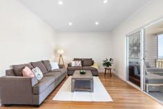 6A Coal St Gerringong NSW 2534 $880,000- $940,000 This charming duplex is perfectly located conveniently between the town centre and the popular Boat Harbour foreshore. Whether you're downsizing, investing or looking for a South Coast escape this modern home has much to offer with it's beautiful ocean and rural views. The split- level design comprises of a bedroom, bathroom and secondary living area on the lower level while the kitchen and main living area are located upstairs with access to a spacious covered entertainment area. A powder room is also provided on this level. The master bedroom with ensuite and walk in robe is located quietly away from the upstairs living areas. Features include timber floors and 9' ceilings. There is a fenced side yard, ideal for a pet or an outdoor play area for children. All within an easy stroll to Gerringong's cafés, shops and bar restaurants. Agent Discloses Interest.