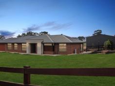 35 Kareen Court Mansfield VIC 3722 $970,000 • Luxurious North facing brick home set on generous 5963m2 (1.5 acres) allotment • Opportunity to further subdivide the land STCA once covenant lifts Dec 2020 • Huge shed with 3 phase power, fully-lined roof, 3 roller doors & open end bay • The magnificent kitchen is the heart of the home with quality stainless steel appliances • Expansive open plan living & dining area flows seamlessly out to undercover alfresco • Lavish parent's wing includes a huge master suite plus a separate sitting/TV area • At the opposite end of the home 3 additional bedrooms all with robing • Spacious main bathroom with shower & bath with separate toilet • Keep comfortable all year round with ducted heating & cooling throughout • Sit back & enjoy the ambience of the crackling wood heater in the cooler months • Laundry with walk in linen/storeroom & concrete pathway to clothesline • Energy efficient with double glazed windows, solar HW, north facing & good insulation • Remote control double garage with direct internal access into the house • Established nectarine, apple, fig, lemon, olive, plum, peach & cherry trees • Fantastic position in a quiet court, minutes to High Street with all town services..