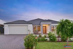 8 Tallerack Street Carramar WA 6031 $700,000's *** GRAND OPENING SUNDAY 22nd NOV 2.15PM – 2.45PM *** Carramar’s premium selling agents are proud to have been selected to present this remarkable 4/5-bedroom, 3-bathroom, residence to the market. Individually designed for the discerning owners & built by the award-winning Aveling Homes; buyers searching for the ultimate in style, space & finish will be instantly captivated by this home. Located in the highly sought after ‘Wildwood Private Estate — Carramar’, in a whisper quiet street; viewing is highly recommended & will not disappoint! Features & benefits include: * Timeless contemporary street appeal * Wide entrance door * Entrance hall with recessed ceiling * Home office/study * Hotel style master bedroom suite with large walk in robe & ensuite with double shower, his & hers vanity with stone bench top, spar bath and separate WC * Spacious, open plan family & meals areas * Storage cupboard * Chef’s kitchen with Essa stone bench tops, breakfast bar, large walk in pantry, double fridge/freezer recess with cold water feed, glass splashbacks, plenty of cupboard space overhead & under bench, stackable windows opening to the alfresco & stainless steel appliances including 900mm oven, cooktop & rangehood * Well-appointed laundry, off the kitchen, with stone bench top, shoppers access from the garage & plenty of cupboard space over head & under bench * Activity room/5th bedroom with sliding door robe * Home theatre with projector, screen, triple, sliding door storage closet, recessed ceiling & stackable, sliding doors leading to the alfresco * 3 further generous bedrooms with built in, sliding door robes & ceiling fans — bedroom 2 with semi-ensuite access to the family bathroom & bedrooms 3 & 4 both with access semi-ensuite access to the 3rd bathroom * Family bathroom with bath, shower & vanity with stone bench top * 3rd bathroom with shower, twin vanity with stone bench top & WC * Separate powder room * Sliding door linen/storage closet * Stepped cornice * Bamboo flooring * Reverse cycle, zoned air conditioning for year-round comfort * Solar electricity system * Stunning alfresco with stepped cornice, ceiling fans & zip track blinds * Liquid limestone * Sparkling, below ground pool with frameless glass pool fencing * Grass area * Koi pond * Garden shed * Double, remote garage with extra width & height * Large 622sqm block * Close to schools, parks, shops & all other local amenities Don’t miss out! Call Team Demo to arrange your viewing!