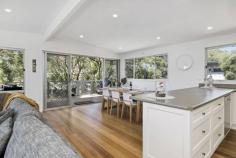 26 Scott St Blairgowrie VIC 3942 $885,000 - $970,000 Superbly updated to provide every contemporary comfort while retaining its laidback beachy chic vibe, this is the perfect home to relax, retire or recharge in a beautiful coastal setting Just a fun bike ride down to Blairgowrie’s fabulous beachside café strip, a couple of minutes to the Tyrone Foreshore boat ramp to launch your boat for a day on the bay or why not explore Bridgewater Bay and the ocean coast only a short stroll in the other direction? The two-storey, three-bedroom home is custom made for blissful beachside breaks or those wanting a permanent sea change set amid native moonah gardens offering dappled shade and privacy with nothing left to do but sit on the entertaining balcony and read the weekend papers or settle back in front of the cosy gas log fire in winter. A crisp interior palette anchored by timber floors provides class and comfort upstairs along with two bedrooms and the main bathroom as well as a spotless kitchen with a stainless-steel oven and dishwasher and ample storage. Sliding doors lead out to the fabulous north-facing entertaining balcony while a second set of stairs descend down to the gardens, a four-car carport and a combined laundry and bathroom and separate bunkroom for the kids. Hockingstuart | Belle Property is proud to be offering this property for sale. To arrange an inspection or for further information, please Tim Bradler on 0400 312 412 or tim.bradler@belleproperty.com