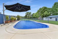 9 Dora Street Dora Creek NSW 2264 $749,000 Set on a huge 2300sqm lifestyle block with entertainers deck, modern inground pool, an abundance of space and massive garage this neat as pin family home will appeal to all buyers. With a welcoming family appeal, this four-bedroom offering is ready to move into and presents huge potential for further expansion on its enormous laser-level block. With warm timber floors and an open-plan, relaxed layout, the home’s big surprise feature is a huge rear entertaining deck that overlooks a glorious sparkling in-ground pool and enticing outdoor spa. A well-maintained kitchen, generous lounge area and cosy dining zone with access outside to the deck adds functionality to the home, whilst two bathrooms, one with curved shower screen and corner spa make the home extra comfortable. With the added benefit of a sleep-out behind the four-car garage, there is room for unexpected guests or teens. Sitting just one block away from the waters of Dora Creek and just moments to the Dora Creek village shops and Sydney Newcastle train line. – Huge potential to maximize the home on a giant ‘can-do’ block, with plenty of room to expand – Well maintained with warm timber floors, crisp clean tones and modern finishes throughout – Well-kept kitchen flows to dedicated dining room and onto expansive entertainer’s rear deck – Four bedrooms, two with built in wardrobes, easy-care with linen cupboard and internal laundry – Two family bathrooms, one with curved glass shower screen and inviting corner spa bath – Stunning sparkling in-ground pool set in huge laser level rear garden with enticing outdoor spa – Massive four-car garage with handy sleep-out/workshop, perfect for teens or surprise guests – Close to school, shops, train and easy drive to Morisset township and freeway entry For more information or to arrange an inspection call Kale 0431 122009 or Steve 0419 277534 Disclaimer: Every precaution has been taken to establish accuracy of the above information but does not constitute any representation by the owner or agent. Information is gathered from sources we believe to be reliable; we cannot guarantee its accuracy and interested persons should rely on their own enquiries.