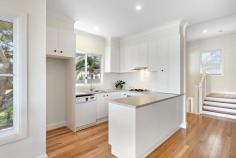 6A Coal St Gerringong NSW 2534 $880,000- $940,000 This charming duplex is perfectly located conveniently between the town centre and the popular Boat Harbour foreshore. Whether you're downsizing, investing or looking for a South Coast escape this modern home has much to offer with it's beautiful ocean and rural views. The split- level design comprises of a bedroom, bathroom and secondary living area on the lower level while the kitchen and main living area are located upstairs with access to a spacious covered entertainment area. A powder room is also provided on this level. The master bedroom with ensuite and walk in robe is located quietly away from the upstairs living areas. Features include timber floors and 9' ceilings. There is a fenced side yard, ideal for a pet or an outdoor play area for children. All within an easy stroll to Gerringong's cafés, shops and bar restaurants. Agent Discloses Interest.