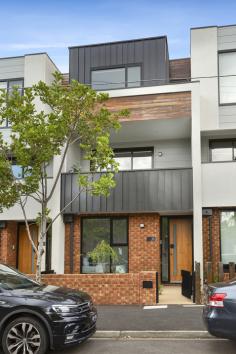 60 Smith Street Kensington VIC 3031 $1,100,000 Immerse yourself in this street frontage near new luxurious town residence. Contemporary living with this three bedroom/three bathroom townhouse superbly positioned 4.5km from the CBD and just walking distance to Newmarket Plaza, Kensington Village, Flemington Racecourse and a choice of train stations. Immediately impressive, the homes bold architectural design begins with a sleek and striking façade, alluding to the quality, sophistication and style that feature within. North facing living domain and sublime gourmet kitchen delivers seamless flow and reveal a gas Miele cooktop, oven, under-mount range-hood and dishwasher plus lustrous stone lined counters and ample cabinetry. Three lavish bathrooms, two being ensuites, service the residences three bedrooms, all with BIRs. Discover true urban excellence for yourself and reap the benefits of city fringe living. The information about this property has been supplied to us by the property owner, while we have no cause to doubt its accuracy, we provide no guarantee. We cannot attest to the functionality of any fixtures, fittings or inclusions to the property. Land and apartment dimensions and floor/site plans are supplied by third parties. Typing mistakes, omissions, transposing can occur, we provide to assist but make no representation. Buyers must carry out their own due diligence. FEATURES Air Conditioning Heating Built-In Wardrobes Close to Transport Close to Shops Close to Schools Ensuite..
