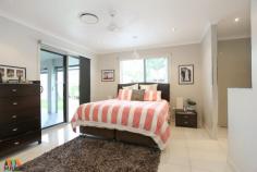 9 HELGA COURT GLENELLA QLD 4740 $650,000 Stunning. Modern. Private. Spacious. Words fail to explain the grandeur of this executive home in a peaceful, popular location of Glenella! Upon entry, be greeted by electric remote controlled security gates that offer the ultimate peace of mind, but also offer video identification for guests via a camera screen on the kitchen wall - say goodbye to door knockers at 6pm! 4 built-in, air conditioned bedrooms are located on the far side of the home with the Master Suite offering a walk in wardrobe, stunning open plan bathroom with walk in shower, double vanity, louvred windows for excellent air flow & sliding glass door entry to the outdoor entertaining area. The 5th room or Office is located adjacent the front entry for easy & immediate business, built in desks & storage. Flowing from the Formal Entry, the private Media Room is perfectly equipped with large projector screen, mood lighting, dark, cozy colour palette & block out blinds. The well-appointed kitchen acts as the central activity hub with stone-top island bench, plumbed/water filtered large fridge cavity; boiling water outlet; bulk-head top-lit definition, overlooking the lounge & dining room that flows effortlessly to the wrap around entertaining deck via 3 glass sliding doors. All seamlessly joined by large sparkling tiles for easy cleaning and glamour. The laundry is another perfectly designed area, with ample storage, good bench space and easy access to outdoor clothesline. The large 8m x 8m HIGH Clearance Double Bay Block Brick Shed has ample power outlets, modern bathroom, fully concreted long driveway from roadside that could easily accommodate more vehicles or caravans. A fantastic 2 storey Cubby House with sandpit underneath will be loved by the kids & the fully fenced yard is ideal for playing children. The double remote panel lift garage with direct access into the home has tiled flooring & air conditioning for additional brilliance to be utilized as a massive playroom, office or workshop. The perfect lifestyle property supporting leisure, work and family life; being within walking distance from Schools, parks and few minutes' drive to Mount pleasant shopping center. Be quick to make this exquisite property your forever home. Disclaimer: The vendors and/or their agents do not give any warranty as to errors or omissions, if any, in these particulars, which they believe to be accurate when compiled. Prospective purchasers should satisfy themselves by inspection or otherwise as to the accuracy of the particulars.