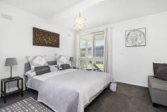25 Kennedy St Blairgowrie VIC 3942 $900,000 - $990,000 Filled with light and natural ambience, a bank of concertina doors create a seamless connection with the outdoors at this delightful three-bedroom home just a short walk to Blairgowrie’s long sandy beach and along the shore to the village cafes. Immaculately presented with a real holiday vibe and superbly positioned, a wide brick-paved driveway leads up to a double carport and the front door, while a second driveway journeys past the house to a lock-up garage at the rear with plenty of room to store all the beach toys. A sun-trap courtyard deck and living area with polished timber floors and a crisp white colour scheme is the entertaining heart of the home with a separate dining area boasting a timber feature wall. The kitchen is timeless in all white finishes and includes a ceramic cooktop, stainless-steel wall oven and dishwasher, room for a breakfast table and a handy servery to the lounge. A sparkling main bathroom offers a shower, bath, modern vanity and chocolate colour scheme, while the master bedroom provides parents with a gleaming all-white ensuite and walk-in robe. The home also features split-system airconditioning, a covered rear veranda, secure front gates and easy-care gardens to give you more time at the beach!. Hockingstuart | Belle Property is proud to be offering this property for sale. To arrange an inspection or for further information, please contact Tony Colles on 0407 382 140 tony.colles@belleproperty.com