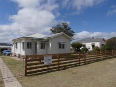 31 Symes St Stanthorpe QLD 4380 $239,000 31 Symes Street Stanthorpe an established residential area of Stanthorpe surrounded by homes of similar age and quality. A short walk to Hospital, Leading restauraunts and parks. This exceptionally well presented home comprises 3 bedrooms separate living room with polished timber floors dine in kitchen with modern kitchen with gas cook top and electric oven plus large pantry. Fully renovated bathroom with tiled floor and walls. 2 toilets plus wet area laundry room. Gas hot water. Established 9m x 6m steel frame gargae plus garden shed fully fenced plus concrete drive and walk ways. This home is ready to move in and enjoy. Owners are asking $239,000 and will consider all reasonable offers. Contact David Schnitzerling on 0418717979 for an inspection.