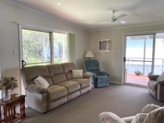 27/300 Kings Point Drive Ulladulla NSW 2539 $365,000 Secure this three bedroom, two bathroom with ensuite and walk-in robe villa in the highly popular Kings Point Retreat. Homes are permanent living and pet friendly. Overlooking bushland, through one of the two large sliding glass doors, you can sit and relax on the wrap around timber decking and enjoy nature on your doorstep. The home is very spacious and neutrally decorated with minimal maintenance required, just move in and relax. Residents have full access to the many onsite amenities including pool, tennis court, function centre and more. A short drive to Ulladulla CBD and a number of local pristine beaches, you have everything the region has on offer only minutes away. Weekly site fee: $134 (not including utilities). No rates applicable. Homes in this complex sell quickly, so do not delay an inspection. Features • Air Conditioning • Area Views • Ceiling Fans • Deck • Ensuite..