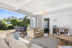 25 Kennedy St Blairgowrie VIC 3942 $900,000 - $990,000 Filled with light and natural ambience, a bank of concertina doors create a seamless connection with the outdoors at this delightful three-bedroom home just a short walk to Blairgowrie’s long sandy beach and along the shore to the village cafes. Immaculately presented with a real holiday vibe and superbly positioned, a wide brick-paved driveway leads up to a double carport and the front door, while a second driveway journeys past the house to a lock-up garage at the rear with plenty of room to store all the beach toys. A sun-trap courtyard deck and living area with polished timber floors and a crisp white colour scheme is the entertaining heart of the home with a separate dining area boasting a timber feature wall. The kitchen is timeless in all white finishes and includes a ceramic cooktop, stainless-steel wall oven and dishwasher, room for a breakfast table and a handy servery to the lounge. A sparkling main bathroom offers a shower, bath, modern vanity and chocolate colour scheme, while the master bedroom provides parents with a gleaming all-white ensuite and walk-in robe. The home also features split-system airconditioning, a covered rear veranda, secure front gates and easy-care gardens to give you more time at the beach!. Hockingstuart | Belle Property is proud to be offering this property for sale. To arrange an inspection or for further information, please contact Tony Colles on 0407 382 140 tony.colles@belleproperty.com