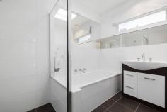25 Kennedy St Blairgowrie VIC 3942 $900,000 - $990,000 Filled with light and natural ambience, a bank of concertina doors create a seamless connection with the outdoors at this delightful three-bedroom home just a short walk to Blairgowrie’s long sandy beach and along the shore to the village cafes. Immaculately presented with a real holiday vibe and superbly positioned, a wide brick-paved driveway leads up to a double carport and the front door, while a second driveway journeys past the house to a lock-up garage at the rear with plenty of room to store all the beach toys. A sun-trap courtyard deck and living area with polished timber floors and a crisp white colour scheme is the entertaining heart of the home with a separate dining area boasting a timber feature wall. The kitchen is timeless in all white finishes and includes a ceramic cooktop, stainless-steel wall oven and dishwasher, room for a breakfast table and a handy servery to the lounge. A sparkling main bathroom offers a shower, bath, modern vanity and chocolate colour scheme, while the master bedroom provides parents with a gleaming all-white ensuite and walk-in robe. The home also features split-system airconditioning, a covered rear veranda, secure front gates and easy-care gardens to give you more time at the beach!. Hockingstuart | Belle Property is proud to be offering this property for sale. To arrange an inspection or for further information, please contact Tony Colles on 0407 382 140 tony.colles@belleproperty.com
