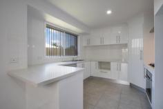 16 Pech Avenue Jindera NSW 2642 $299,000 Set in the lovely town of Jindera is this immaculate, modern & spacious 2 bedroom townhouse with plenty of parking & loads of features. You are greeted to a large sun-filled lounge & both bedrooms include a double robe & ceiling fan. The kitchen is crisp, clean & gloss white with gas & electric cooking overlooking a large tiled family meals area. A full bathroom & a separate laundry with good storage add to the comforts Step outside to a fully under cover outdoor living area & you'll not have to lift a finger as you sit & enjoy the low maintenance & private yard. The double garage has internal access, remotes, rear roller door plus a handy extra car bay for visitors, trailer, boat etc Best of both worlds with all the amenities of Albury City close by while enjoying the layback country town lifestyle Hurry, this townhouse has it all!