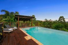14 Trainstop Court Bli Bli QLD 4560 $1,395,000 This Hamptons inspired residence is hidden away in a very quiet part of the Sunshine Coast with a forest backdrop and a brilliant vista. Obvious to all who view is the quality of this home with its mix of indoor and outdoor living. The open plan design is complimented by the fact that there are areas where you can be by yourself at any time. Central to the home is a gourmet kitchen fitted with a 5 burner gas cook top and a 900mm country oven, stone bench-tops and a huge 4 metre island bench. There are three distinct covered outdoor entertainment areas ranging from a gazebo alongside a 10 x 5m resort style pool to a view deck on the main living and another off the lower level. This self-contained lower level represents options like guest accommodation, work from home with NBN coverage or even generate an income with rental possibilities. The professionally landscaped gardens are serviced by a computerised fully programmable irrigation system, plus town water, a quality bore and a bonus 20,000 litre rain water tank. As well as garaging for 4+ vehicles, there is a huge air-conditioned room (6.7 x 5m) would be perfect for jet-ski's, motor bikes, studio, fitness training, consultation or workshop. Only an inspection will show you just how good this very private residence will be for your family. • Four spacious bedrooms all with robes plus a dedicated office • Main bedroom with ensuite, walk-in-robe and private deck • Covered alfresco dining areas • Hardwood timber flooring throughout • Extremely private location in quiet cul-de-sac • Ducted air-conditioning & LED lighting • Modern kitchen featuring stone bench tops • Self-contained lower level with second double garage and large workshop • Powered 6 x 3m shed • Plenty of parking for additional cars or caravan • 6,883m2 allotment • 5 minutes to Bli Bli shopping centres • 18 Minutes to Sunshine Plaza. • 12 minutes to Sunshine Coast Grammar • 13km to Mudjimba Beach • 12 minutes to Sunshine Coast International Airport • 20 minutes to Sunshine Coast University FEATURES: • Air Conditioning • Built-In Wardrobes • Dual Living • Formal Lounge • Garden • Polished Timber Floor..