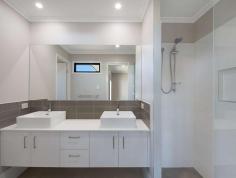 8 Tamarind Court Woombye QLD 4559 Whether you are looking for a "tree change" or are a young family wanting to raise your children somewhere a little bit "quieter", Woombye is a great location. This brand new beautiful 4 bedroom home is just minutes to the Woombye Village and shops, schools and bus stops and the train station. It is an easy 30 minute drive to the beaches; 25 minutes to the Sunshine Coast University Hospital and close to some of the best schools on the coast. This stylish home offers a spacious layout with open plan kitchen, dining and living flowing through large glass doors to a big patio with sweeping mountain views. High ceilings and large windows allow lots of natural light through and there is a separate family/media room. High quality fixtures and fittings include waterfall stone benchtops and butlers pantry in the kitchen, a 900mm freestanding gas cooktop and integrated microwave, stylish light pendants and Italian tiles throughout. Rooms are generously sized, bathroom and ensuite are beautifully finished with lots of extra storage in this home and enough space for a caravan or boat on the side of the property. It is only 20-30 minutes to the charming towns of Montville and Maleny with glorious views, rainforest walks and unique shopping and dining experiences or you can head to Mooloolaba to enjoy their fabulous restaurants and night life. As one of the villages of the Sunshine Coast hinterland, Woombye is close to everything due to its central location, yet far enough away from the busy tourists and traffic on the coast to enjoy a quiet and peaceful lifestyle. • Tranquil setting in a great neighborhood • Elevated with sweeping mountain views • Brand new home with 7 year build warranty • Weekly rent of $670-700 could be achieved • Spacious, open plan living with high ceilings • Quality fixtures & fittings & ample natural light • Space for a Caravan or boat on the side of the property • Well located close to all amenities & short drive to CBD & Beaches • Home meets eligibility for the First Home Owners Grant of $15,000 for approved buyers Shortlist this property and book an inspection today!