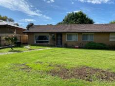 17 Mill St Toora VIC 3962 $365,000 Supersized home set on a large 986m2 block with rear access from laneway to LU garage / workshop and sheltered, fully fenced garden. Large 'L' shaped living room with new carpet and RC/AC for year round comfort. Lots of retro features with built in drinks cabinet, timber features and lots of storage. Kitchen with electric stove and skylight. Four fitted bedrooms plus study, master with ensuite. Main family bathroom with bath, shower and separate w.c. Laundry with external access. Covered rear games room. Quiet location with the Pear Orchard almost opposite and access to the Great Southern Rail Trail at the end of the street in this picturesque Historic township with so much to offer, just 2kms to boat launching and the pristine coastline