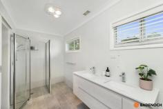 84 Maitland Street Hackett ACT 2602 ***Although restrictions have lifted please remember COVID-19 guideline rules. Social distancing is to be respected. *** Situated in the perfect location within the ever popular suburb of Hackett is where you will find this fabulous 5 bedroom, two bathroom family home. First impressions count and the kerb appeal of this quality home is striking with a Hampton Style façade and private front courtyard. This single level home will impress and has been lovingly renovated throughout over the last 5 years. The generous floor plan caters for a growing family and offers the choice of 2 large living areas with the formal lounge positioned at the front of the home. Adjacent is the open planned family room is the stylish renovated kitchen which is the heart of this home and has been fitted with tasteful inclusions, plenty of storage along with quality stone bench tops. At the rear of the property are the 5 generous bedrooms with one currently converted to a home office. The master bedroom boasts a luxurious ensuite with double basin and separate toilet. The low maintenance enclosed backyard is where the kids can play whilst the parents share a wine on the elevated deck. Located within the catchment area for North Ainslie Primary and moments to numerous other schools including Rosary Primary, Dickson College, Daramalan College and ACU, close proximity to Mount Majura Walking Trail and nature reserve, the local Hackett IGA, bus stops and only a short distance to the City, Dickson, Ainslie shops and main arterial roads including the Federal Highway and Barton Highway. The quality features include: • Single level design • Tastefully renovated throughout • 5 generous bedrooms or 4 bedrooms and a study • Additional utilities room or small second study • Stylish kitchen with dual ovens, gas hot plates, dishwasher and waterfall island bench • Two large living areas • Plantation shutters to formal lounge • Luxurious 2-way ensuite with double basin • Ducted gas heating • Reverse cycle split system to open plan family room/kitchen • Instant gas hot water • Floating timber oak floor throughout • Carport with remote controlled panel lift door..