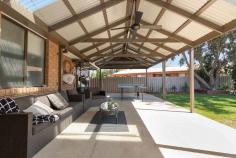 35 Lawson Drive Moama NSW 2731 $505,000 Home is where the heart is and this home would surely be that happy place. Located in the heart of Moama in a sought after locale overlooking a small reserve is 35 Lawson Drive. There are some new additions including an extension with a new large master bedroom with built in robes and ceiling fan, a stylish bathroom with a large shower, and a second living area or possibly a fifth bedroom. Other bedrooms also have ceiling fans and the second bathroom has a bath and shower. The kitchen has also had a modern style renovation which is open plan to include dining. The kitchen overlooks a fernery to one side and the rooms are filled with loads of light. Outside is a super spacious undercover entertaining area overlooking a generous garden. There is 2.5Kw solar on the roof, ducted heating and cooling and side access on both sides of the home if you have a caravan, boat or extra cars. An ideal home if you are downsizing, 1st home or investment. There is a lot more to brag about, but we would rather surprise you. Call now!! FEATURES: • 2.5 KW Solar • Air Conditioning • Built-In Wardrobes • Close To Schools • Close To Shops • Close To Transport • Fernery..