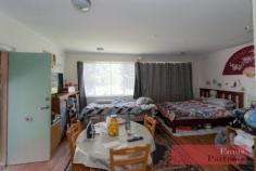 81 Shakespeare Ave Magill SA 5072 $695,000 to $725,000 Well situated on an established elevated corner block of 760 sqm (approx.) block, with a driveway from Third Street, this c 1962 brick and tiled home needs renovation, or perhaps speak to the council about the possibility of demolishing and building a new home (or homes) here. (STCC). Situated on prestigious Shakespeare Avenue this is an exciting opportunity! The home currently comprises Two bedrooms Lounge with split system air conditioner Kitchen and Meals Small sun room/study Basic bathroom with separate wc North facing sitting room/third bedroom with a bathroom, and second kitchen/meals with separate entrance. (currently used as a “granny flat”) Other features include: Rear verandah with ceiling fans Double end on end garage/carport with electric roller door Large rear yard with established gardens Separate gates of Third St to the rear yard The home itself has been a wonderful family home but has not been updated for many years. The good news is that it is on an excellent corner block of land and is well positioned in the rapidly transforming suburb of Magill, adjacent to Tranmere. There are good local schools, the Magill TAFE is close by, and at the other end of the Street, after passing by the beautiful “Gums” recreation park you will fund K-Mart Firle, together with a vast array of shops, cafes, and other great retail and fast food outlets. The home is currently rented to wonderful tenants until 16th March, and possibly longer if that would be your desire. An amazing opportunity is to purchase a well priced property to either make-over, or push- over and re-develop subject to necessary consents. A super investment in this most popular precinct! Offered for sale by way of EXPRESSIONS OF INTEREST, concluding at 11 am on Friday 18th December 2020 (unless sold beforehand).