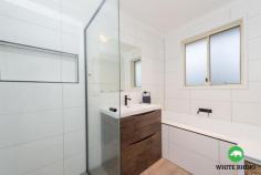 6/49 Erin Street Queanbeyan NSW 2620 $540,000-$580,000 White Rhino is pleased to present this beautiful three bedroom freestanding townhouse in Queanbeyan. Accommodating and adaptable, a prime opportunity presents for first home buyer, investor or downsizer to purchase this well-maintained newly renovated home. A spacious and light filled north facing living area hosts a gas fireplace, so you will be comfortable all year round. The cosy living area is the perfect place to relax and enjoy a glass of wine in front of the fire. Central to the home connecting to the living and dining area sits the renovated modern kitchen, which is sure to be the hub of the home. The chic white kitchen is striking and features handmade italian tiled splashbacks, stone benchtops, ample bench & storage space and custom built cupboards. The kitchen is spacious and well equipped with gas cooktops, electric oven, dishwasher and pantry. The light filled kitchen is complemented by large windows allowing one to enjoy the morning sun. Accommodation comprises of three bedrooms, the master bedroom with ensuite and built-in wardrobe. The fully tiled renovated second bathroom hosts, a bath, shower and timber vanity. Positioned at the end of a quiet complex, this single level residence is private and tranquil. Well located within minutes walking distance to Queanbeyan's CBD, public transport and the Queanbeyan District Hospital this home has a central location. A unique opportunity presents itself for a lucky buyer to secure this charm filled quaint home in the sought after suburb Queanbeyan. Features: Master bedroom with ensuite Built-in wardrobes to master & 2nd bedroom 3rd bedroom Renovated bathroom with separate bath, shower & vanity Lounge room facing north Renovated white kitchen Stone benchtops & tiled splashbacks Gas cooktop, electric oven & dishwasher Kitchen with dining area Laundry Separate guest loo Gas fireplace Reverse cycle air conditioning Freestanding end unit Single level Low maintenance rear courtyard Single garage with automatic door Side gate access 2 Additional car spaces in front of the home NBN is fully connected Currently tenanted at $500pw, lease expires end of Jan 2021 Strata is pet friendly FEATURES: Close to Transport Close to Shops Close to Schools