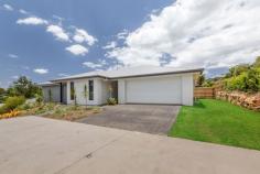 8 Tamarind Court Woombye QLD 4559 Whether you are looking for a "tree change" or are a young family wanting to raise your children somewhere a little bit "quieter", Woombye is a great location. This brand new beautiful 4 bedroom home is just minutes to the Woombye Village and shops, schools and bus stops and the train station. It is an easy 30 minute drive to the beaches; 25 minutes to the Sunshine Coast University Hospital and close to some of the best schools on the coast. This stylish home offers a spacious layout with open plan kitchen, dining and living flowing through large glass doors to a big patio with sweeping mountain views. High ceilings and large windows allow lots of natural light through and there is a separate family/media room. High quality fixtures and fittings include waterfall stone benchtops and butlers pantry in the kitchen, a 900mm freestanding gas cooktop and integrated microwave, stylish light pendants and Italian tiles throughout. Rooms are generously sized, bathroom and ensuite are beautifully finished with lots of extra storage in this home and enough space for a caravan or boat on the side of the property. It is only 20-30 minutes to the charming towns of Montville and Maleny with glorious views, rainforest walks and unique shopping and dining experiences or you can head to Mooloolaba to enjoy their fabulous restaurants and night life. As one of the villages of the Sunshine Coast hinterland, Woombye is close to everything due to its central location, yet far enough away from the busy tourists and traffic on the coast to enjoy a quiet and peaceful lifestyle. • Tranquil setting in a great neighborhood • Elevated with sweeping mountain views • Brand new home with 7 year build warranty • Weekly rent of $670-700 could be achieved • Spacious, open plan living with high ceilings • Quality fixtures & fittings & ample natural light • Space for a Caravan or boat on the side of the property • Well located close to all amenities & short drive to CBD & Beaches • Home meets eligibility for the First Home Owners Grant of $15,000 for approved buyers Shortlist this property and book an inspection today!