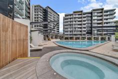 248/7 Irving Street Phillip ACT 2606 $515,000 Arguably the best 2 bedroom property within Trilogy, this stunning apartment set on the top floor will inspire. Soaring views across the Woden Valley towards Red Hill are never to be built out, bathing the accommodating floor plan with an abundance of natural light. Contemporary open plan living flows effortlessly through to a full-width balcony. The designer open plan kitchen, with plenty of storage, features stone benches, and high-end appliances. Each bedroom spacious in size, the master complete with floor-to-ceiling windows, walk through wardrobe, and ensuite. In addition, there are 2 secure side-by-side car spaces in the basement, though the proximity to the Woden town center will make walking a more convenient option in many cases. Within the building, a comprehensive gymnasium and resort-style pool facilities merely add to the quality of life on offer. Inspections are highly recommended. Features: • Large living & dining areas • EER 6 • 14m2 balcony • 80m2 internal living • Level 12 • Ceiling fan in the bedroom • Window treatments already installed • 2 spacious bedrooms • Reverse-cycle air conditioning • Full height wall tiling to ensuite & bathrooms • Visitor access via intercom • Lift access from the basement • 2 carparks side-by-side & lockable storage in the basement • Large heated outdoor swimming pool, BBQ areas & gym in the complex Rates: $348 p/qtr approx Land Tax (if rented): $428 p/qtr approx Body Corporate:$933.57 p/qtr approx FEATURES: • Air Conditioning • Built-In Wardrobes • Close To Schools • Close To Shops • Close To Transport • Secure Parking..