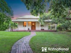369 Heatherton Road Narre Warren North VIC 3804 This historic Victorian weatherboard homestead is set amidst one acre of parklike surrounds on the top of the ridge at Narre Warren North. The character filled cottage comprises two double bedrooms, study, front parlour and separate lounge (both with open fires), farmhouse kitchen with wood stove recess, light filled vestibule and simple but practical bathroom. A further storage area within the home and a detached storage/shower and WC are complimented by a lofty double garage and workshop at the property’s entry (an ideal future studio). The property’s extensive grounds leave plenty of room for further improvements, extension etc. and are studded with magnificent specimen trees, garden beds and meandering paths. A property with enormous character, just perfect as is or brimming with potential for those with vision. • Key Features • Fire Place • Floorboards..