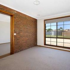 7 Lachlan Court West Wodonga VIC 3690 $399,000 Located in a West Wodonga Court close to Sporting facilities, Shopping Centre and Wodonga TAFE/La Trobe University, this is great family home. Offering 4 Bedrooms, the master at the front of the property has an ensuite and walk-in robe, the three remaining bedrooms are at the back of the property with access through to another bedroom or living room. Good size living area with the main lounge at the front and an open plan kitchen dining. The Outside offers an allotment of 858m2, double carport with access through to the backyard for a shed. With Some renovations and updating this could be your forever home. Ring today for an inspection! FEATURES: • Air Conditioning • Built-In Wardrobes • Close To Schools • Close To Shops • Close To Transport • Garden..