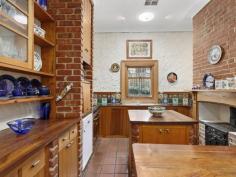 17 Nottage Terrace MEDINDIE SA 5081 $980,000 Nestled behind a beautiful stone wall, and enjoying the acoustic benefits of a combination of bluestone construction and double glazed windows, this wonderful character home offers the new owners the opportunity to secure a prestigious Medindie address with the freedom to adapt the property to their own unique requirements. The front four rooms of the main house are currently utilised as two beautiful bedrooms and a formal lounge with adjoining study. The existing layout lends itself to the possibility to enjoy the front room as a wonderful master bedroom with adjoining dressing room or even the perfect space for the addition of an ensuite bathroom. Continuing further through the property, the spacious kitchen is filled with beautiful natural light thanks to the cleverly located skylights. The central island and large wrap around bench tops allow for plenty of preparation space for even the most adventurous chef and the adjoining dining room offers the perfect space for entertaining a large collection of family and friends. The open lounge at the back of the house overlooks the private leafy garden and wraps around a spacious bedroom complete with large built-in wardrobes. A generous family bathroom featuring a classic claw foot bath and separate shower together with a European style laundry complete the footprint of the main residence. The detached two storey coach house is the surprising secret ingredient in this magical piece of Medindie. Downstairs, the open plan living and dining areas are complemented by a galley style kitchen together with a neat bathroom. Traveling up the intriguing spiral staircase the bedroom features a striking cathedral ceiling and beautiful polished timber floor. Currently utilised as rented guest accommodation, this amazing space will appeal to those looking to accommodate a large family or someone searching for a spacious home office or unique creative space. Key features include: • Stone fronted character villa • Flexible floor plan with eight rooms in the main residence • Two storey detached coach house with kitchenette & bathroom • Outside storage room or perfect workshop • Ducted reverse cycle air conditioning • Character fireplaces and polished timber floors • Natural stone wall & remote gate access • Two car carport • Low maintenance gardens with pretty rotunda • Easy walking distance to the parklands and North Adelaide • Close to Wilderness & St Andrews schools • Zoned to Walkerville & North Adelaide Primary Schools • Zoned to Adelaide & Adelaide Botanic High Schools..